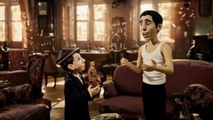 Animated young Carlos Gardel looks up at an older figure while holding a carved wooden object.